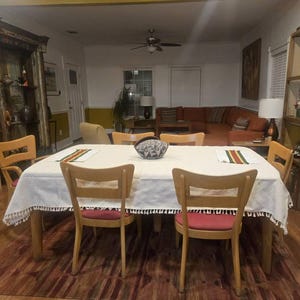 C. hat ein Foto des gekauften Artikels hinzugefügt