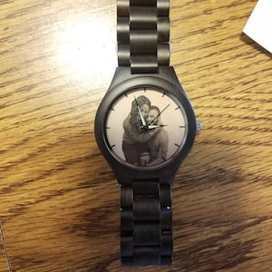 Betsy added a photo of their purchase