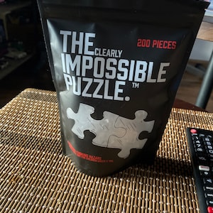 The Clearly Impossible Puzzle, 200 pieces (medium). A real rollercoaster of  emotions, I'll tell ya : r/Jigsawpuzzles