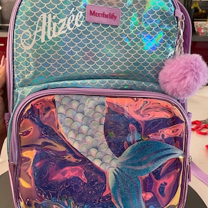 LAURA added a photo of their purchase