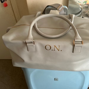 Olivia added a photo of their purchase