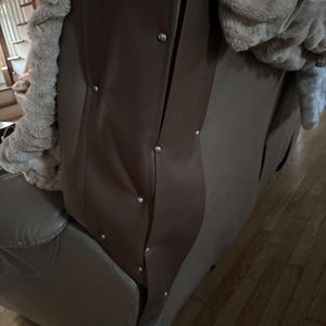 Betsy added a photo of their purchase