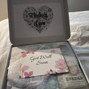 Sarah added a photo of their purchase