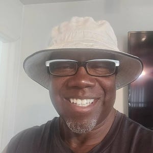 Ricky Hill added a photo of their purchase