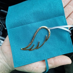 Sarah added a photo of their purchase