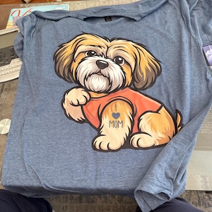 Denise added a photo of their purchase