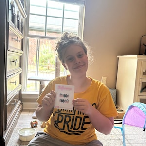 Alaina added a photo of their purchase