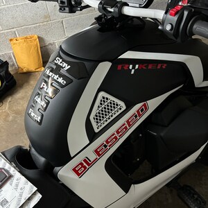 Khalid added a photo of their purchase