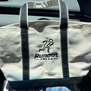 kimberly added a photo of their purchase