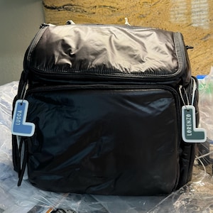 Nikki added a photo of their purchase