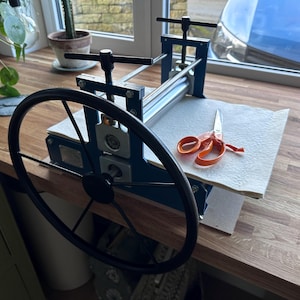Kathryn added a photo of their purchase