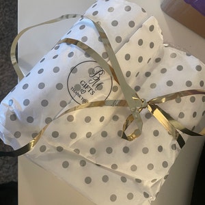 Amina added a photo of their purchase