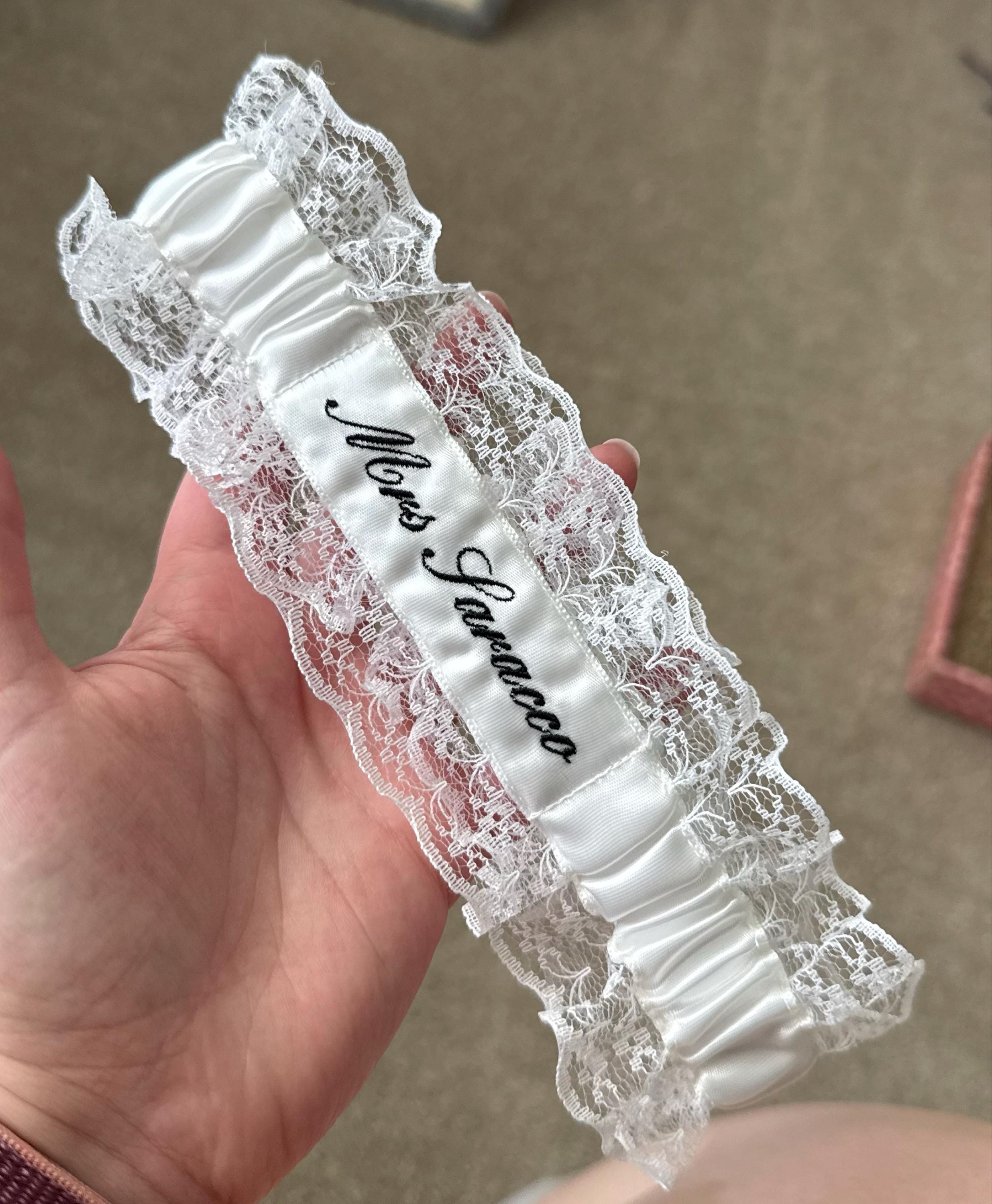 Embroidered personalised garter in white, bridal white or Ivory with a choice of embroidery thread colour.