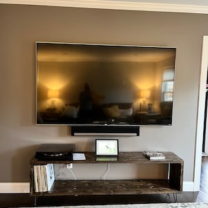 Jennifer added a photo of their purchase