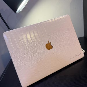 Elaine added a photo of their purchase