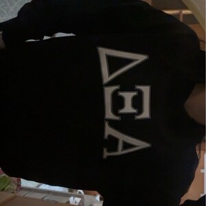 Leila added a photo of their purchase