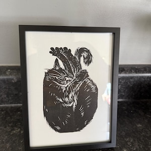 Taylor added a photo of their purchase