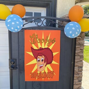 ウッディーズラウンドアップポスター ディズニーアトラクション
