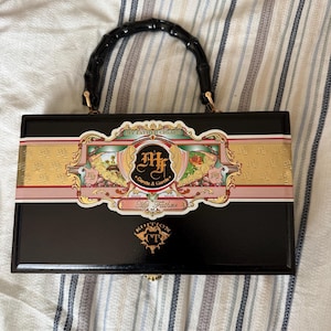 Malikka added a photo of their purchase