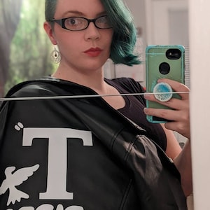 Aimee added a photo of their purchase
