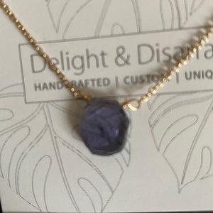 NATALYA added a photo of their purchase
