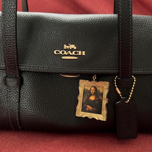 Gabriella added a photo of their purchase