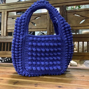 Eliane added a photo of their purchase