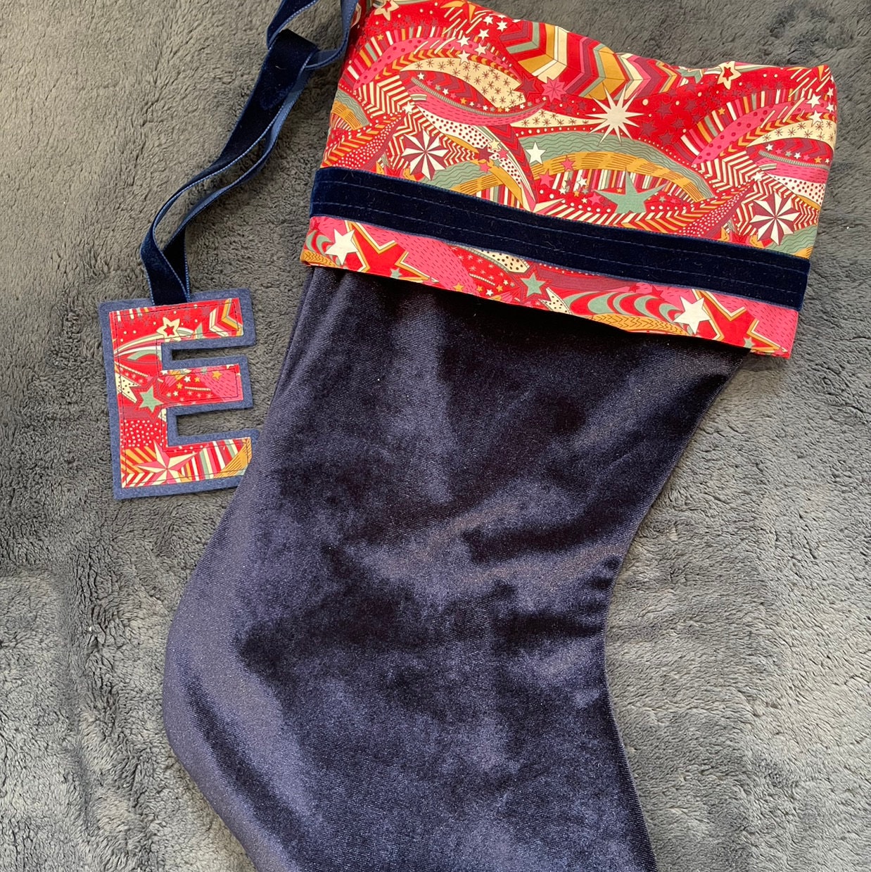Liberty and velvet Christmas stocking with optional personalisation.