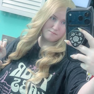 Caitlin added a photo of their purchase