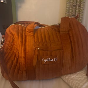 Cynthia added a photo of their purchase