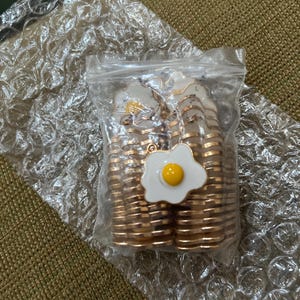 Samantha Paladini added a photo of their purchase