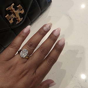 Angela added a photo of their purchase