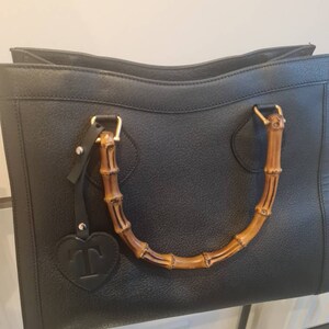 Tatiana added a photo of their purchase