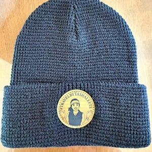 Tasha added a photo of their purchase