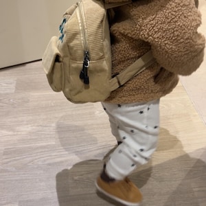Fathma added a photo of their purchase