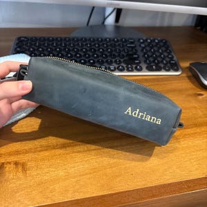 Adriana added a photo of their purchase