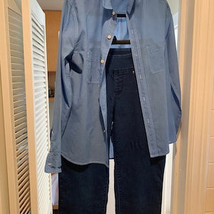 Carolyn added a photo of their purchase