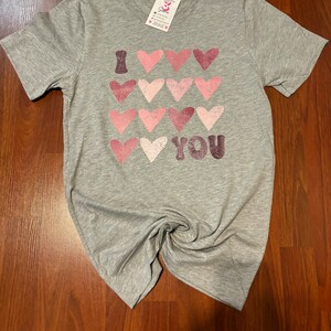 Gloria added a photo of their purchase