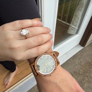 Rebekah added a photo of their purchase