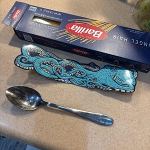 Raquel added a photo of their purchase