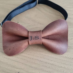 steel blue suspenders and bow tie