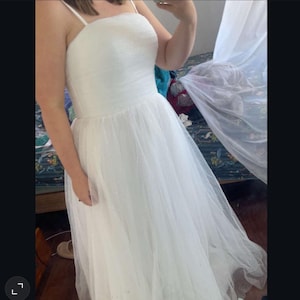 Katya added a photo of their purchase