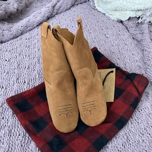 Nicole added a photo of their purchase