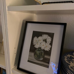 Eleanor added a photo of their purchase