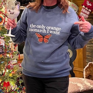 Taylor added a photo of their purchase