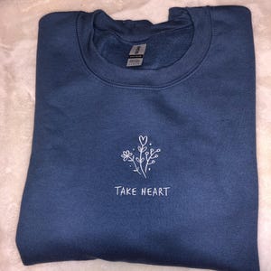 Sarah added a photo of their purchase