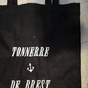 baptiste added a photo of their purchase