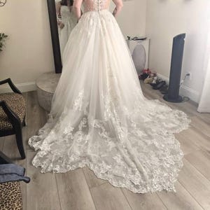 Gina added a photo of their purchase
