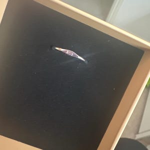 Rebecca added a photo of their purchase