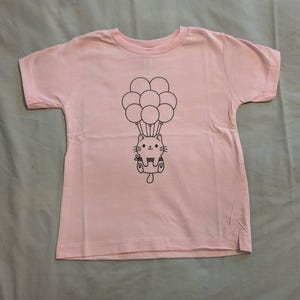 Laura added a photo of their purchase